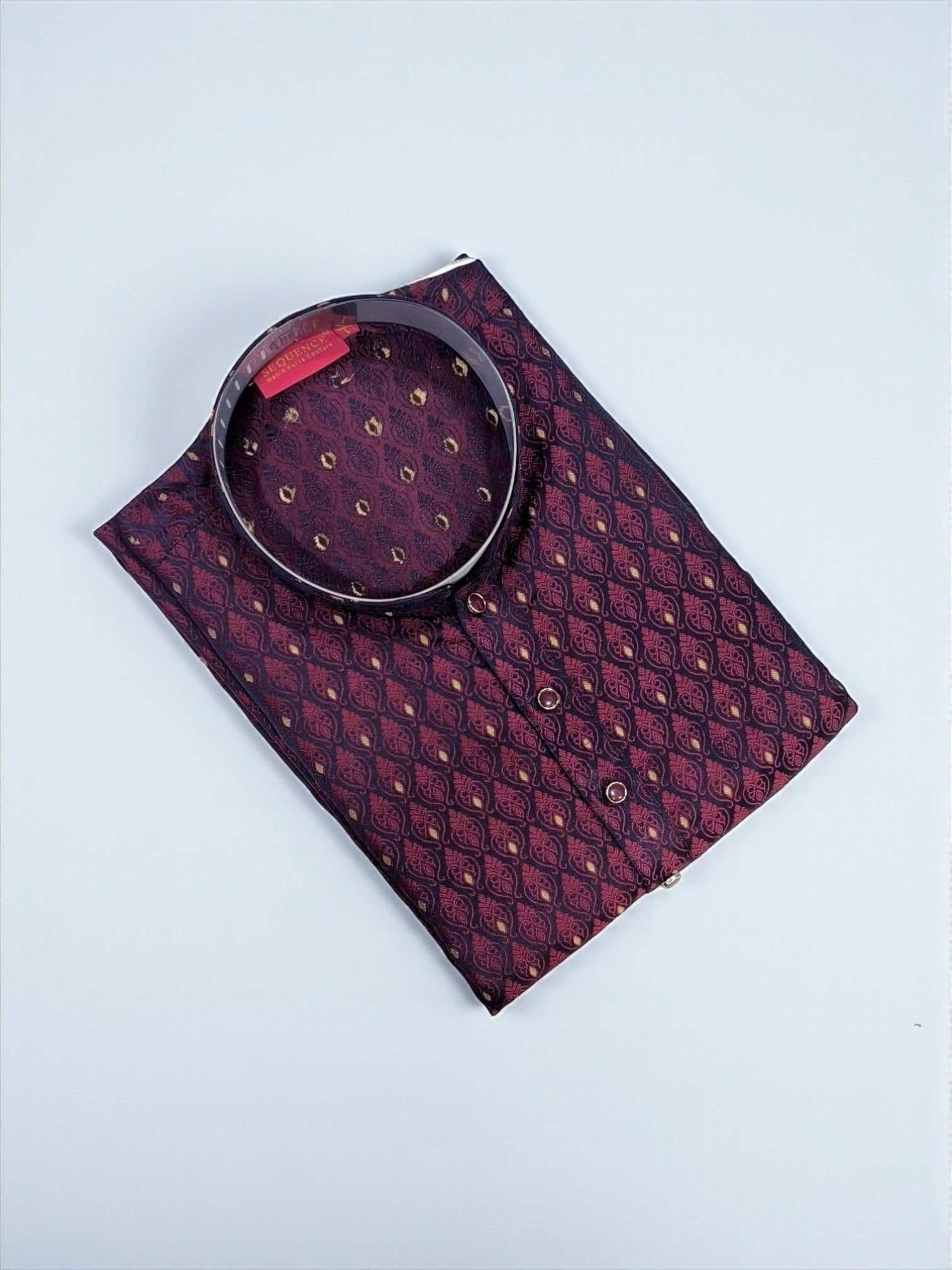 Maroon traditional men's kurta and pajama set from Saree Ghor Charlotte, featuring intricate embroidery and classic fit.