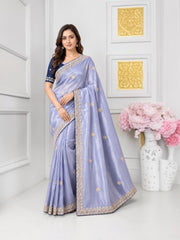 Traditional Saree from Saree Ghor Charlotte featuring intricate patterns and vibrant colors, cultural wear for women.