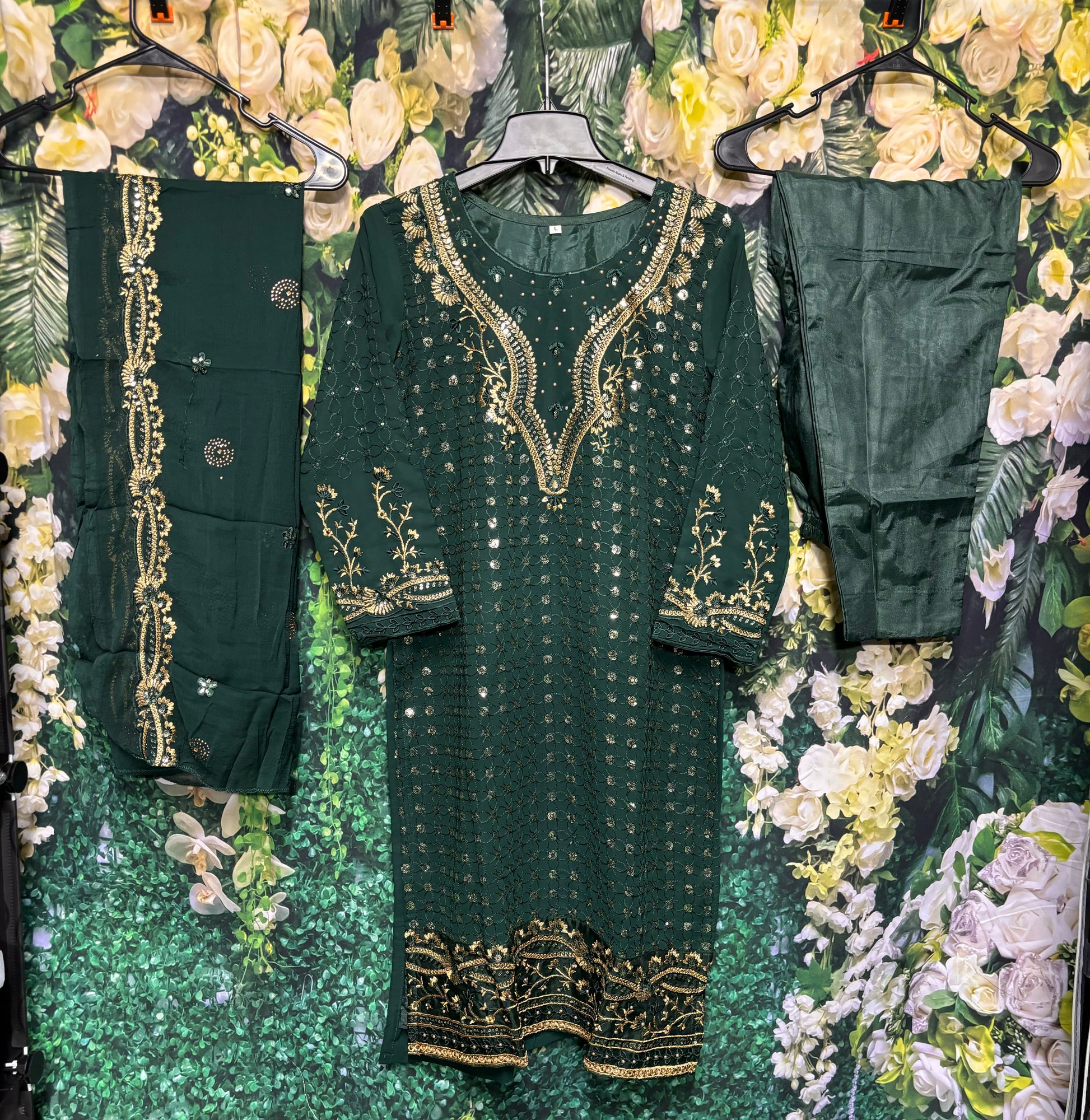 Faux Georgette traditional women's salwar kameez with intricate embroidery, cultural wear from Saree Ghor Charlotte.
