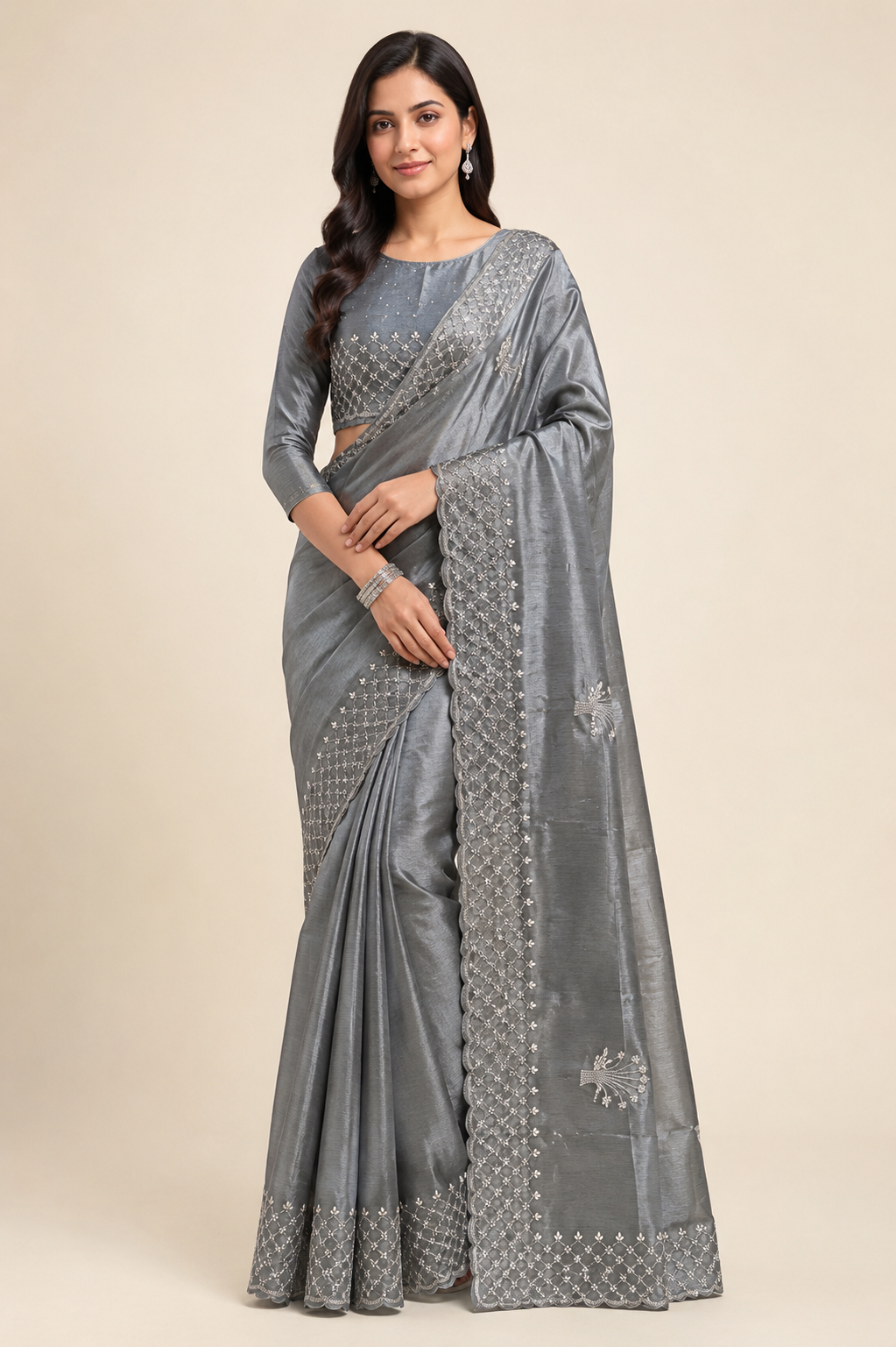 Designer Saree with ready blouse from Saree Ghor Charlotte, showcasing intricate fabric and elegant draping for women.