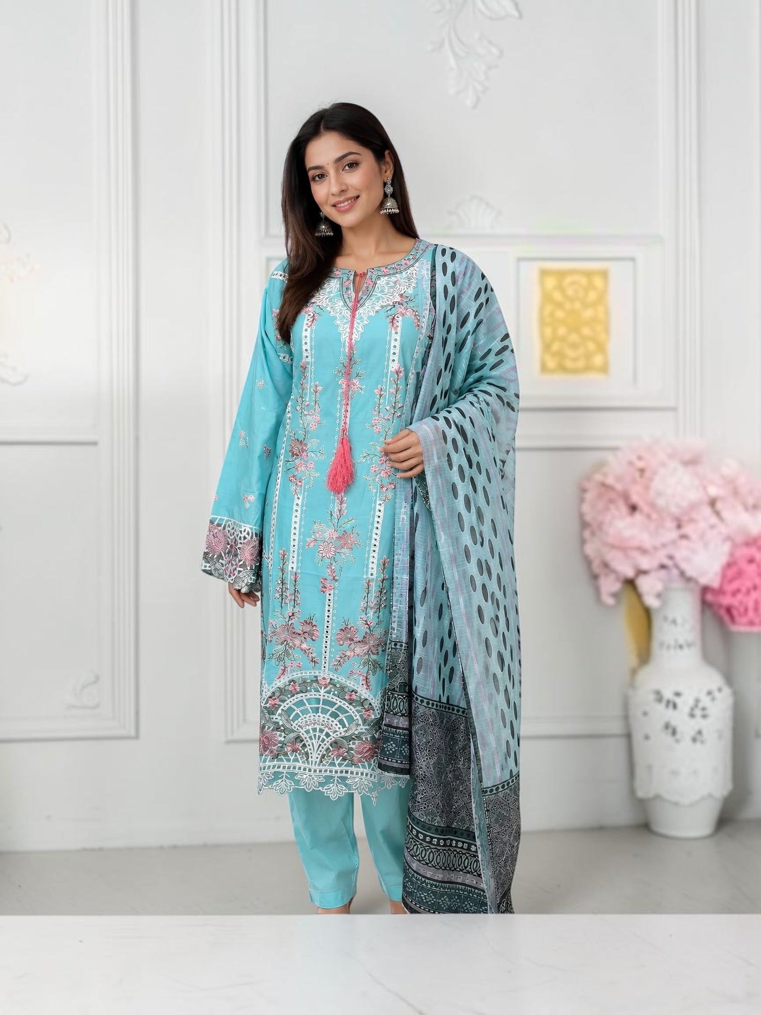 Traditional Pakistani Salwar Kameez for women by Saree Ghor Charlotte, featuring vibrant cultural wear with intricate patterns.