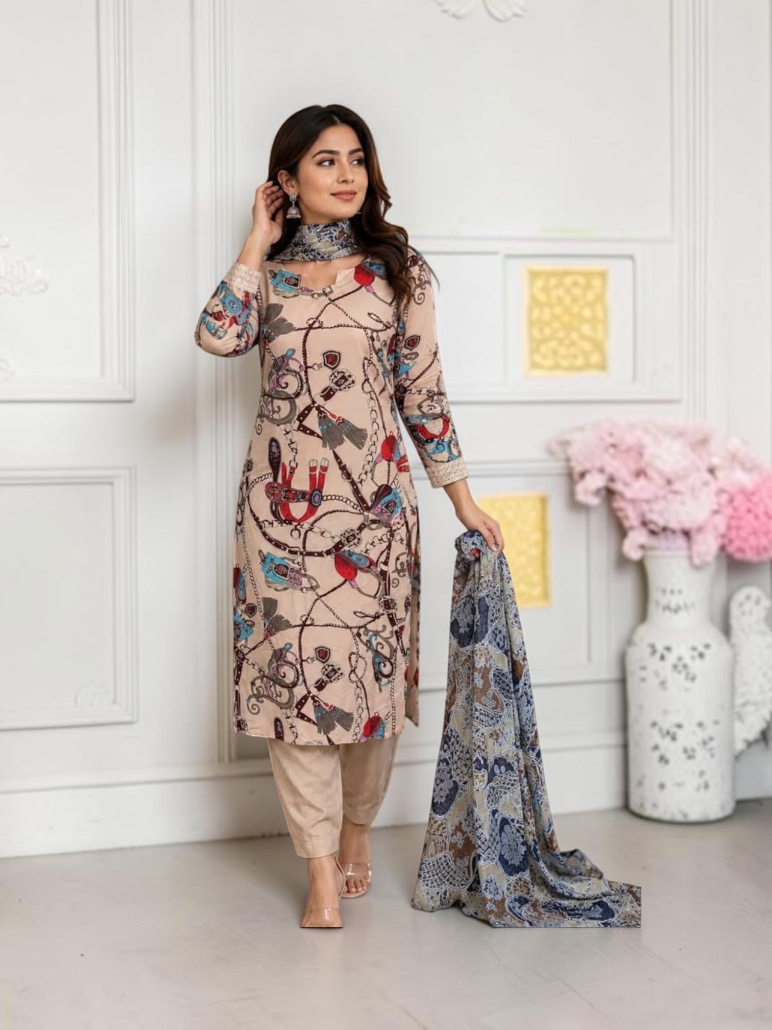 Traditional Saree Ghor Charlotte Salwar Kameez set for women, featuring vibrant fabric and intricate embroidery.