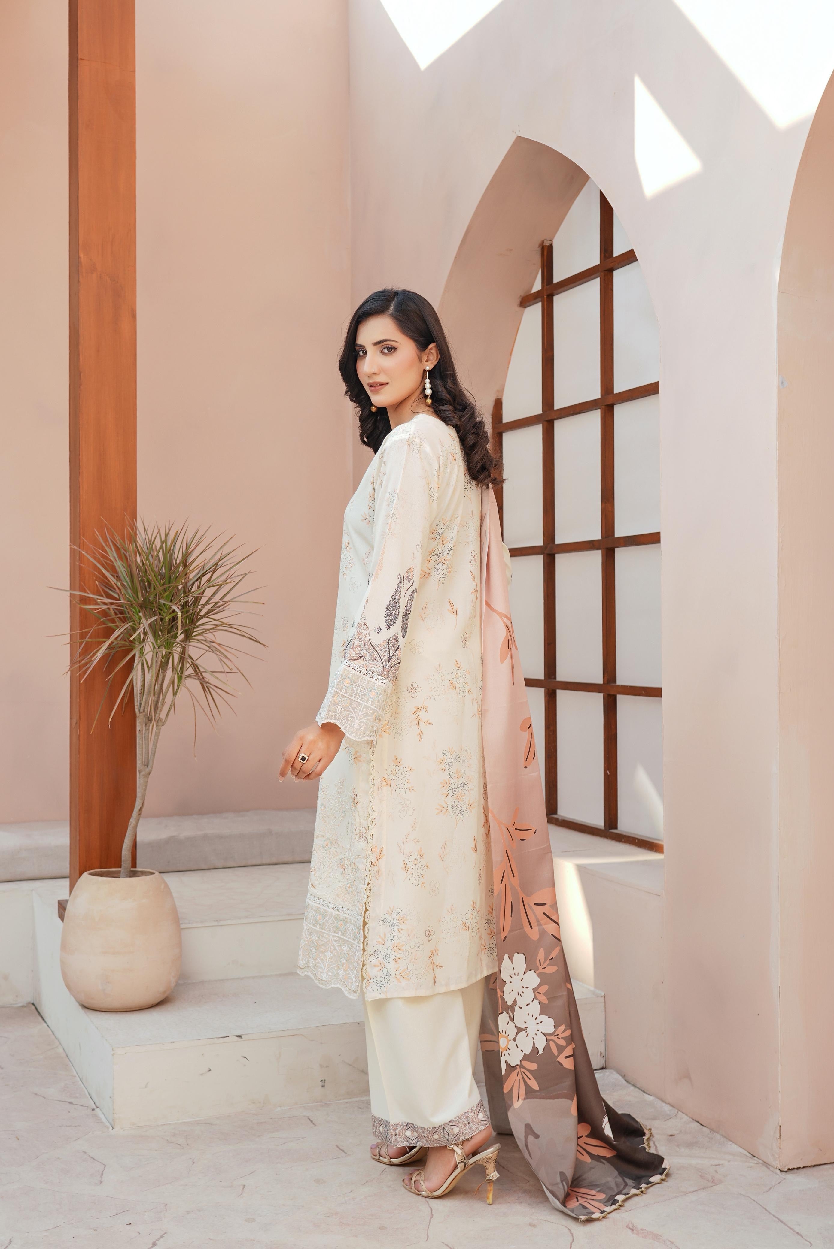 Traditional Pakistani Salwar Kameez for women featuring vibrant fabric and intricate embroidery, by Saree Ghor Charlotte.