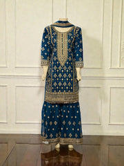 Traditional Salwar Kameez for women by Saree Ghor Charlotte, featuring vibrant cultural wear with intricate embroidery and flowing fabric.