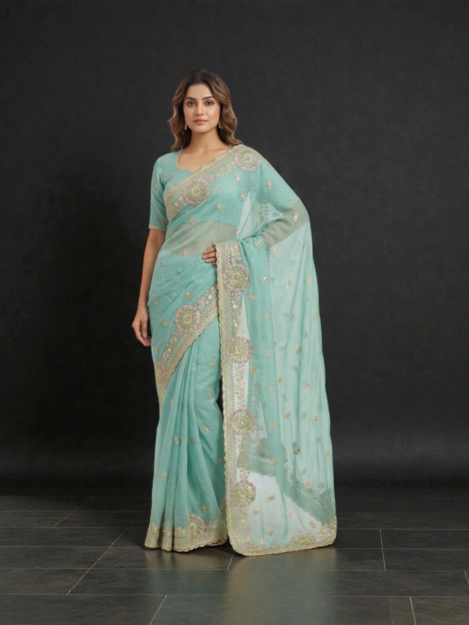 Traditional Saree by Saree Ghor Charlotte featuring intricate embroidery and vibrant colors for cultural women's wear.