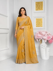 Elegant designer saree with ready blouse from Saree Ghor Charlotte, featuring vibrant traditional cultural wear for women.