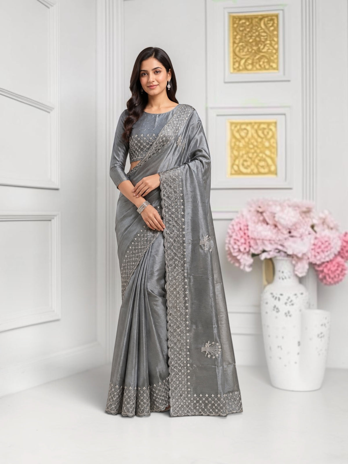 Elegant designer saree by Saree Ghor Charlotte with a ready blouse, showcasing intricate traditional patterns for women's cultural wear.