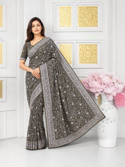 Traditional Saree by Saree Ghor Charlotte with ready blouse, elegant cultural wear for women, featuring intricate patterns and vibrant colors.