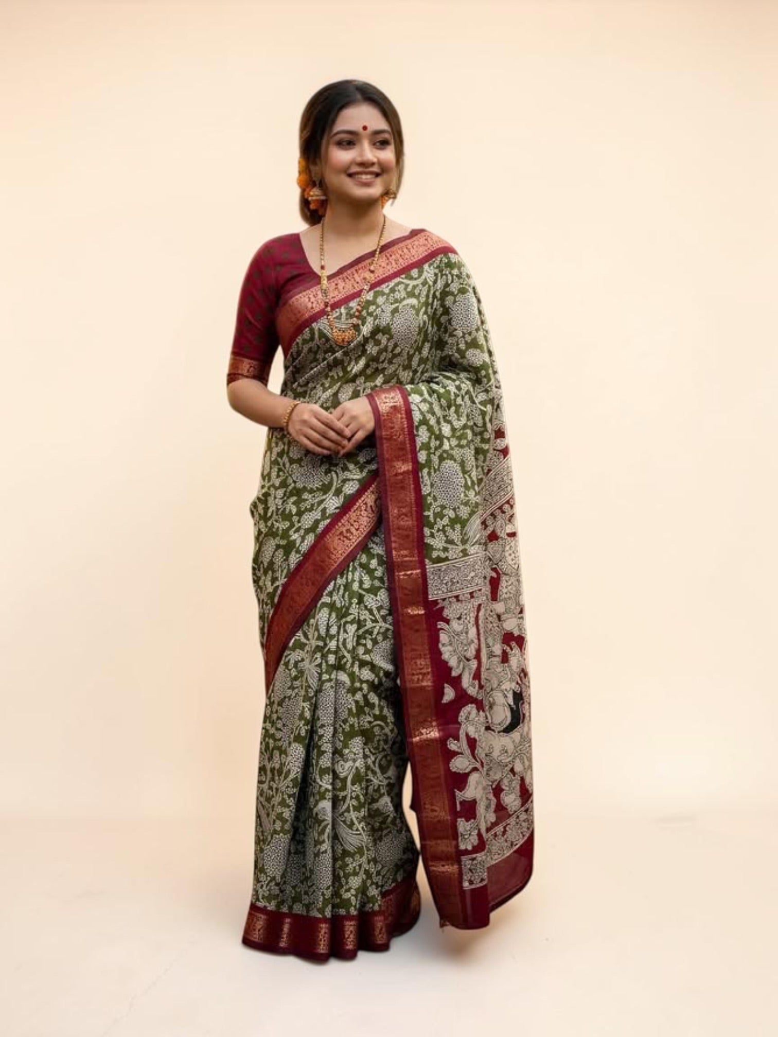 Elegant traditional saree from Saree Ghor Charlotte, showcasing vibrant fabric and intricate draping for cultural wear.