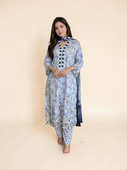 Traditional Pakistani Salwar Kameez by Saree Ghor Charlotte, vibrant cultural wear for women, showcasing intricate design and colorful fabric.
