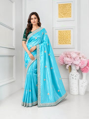 Elegant traditional saree by Saree Ghor Charlotte, showcasing vibrant cultural wear with intricate patterns and rich fabric.