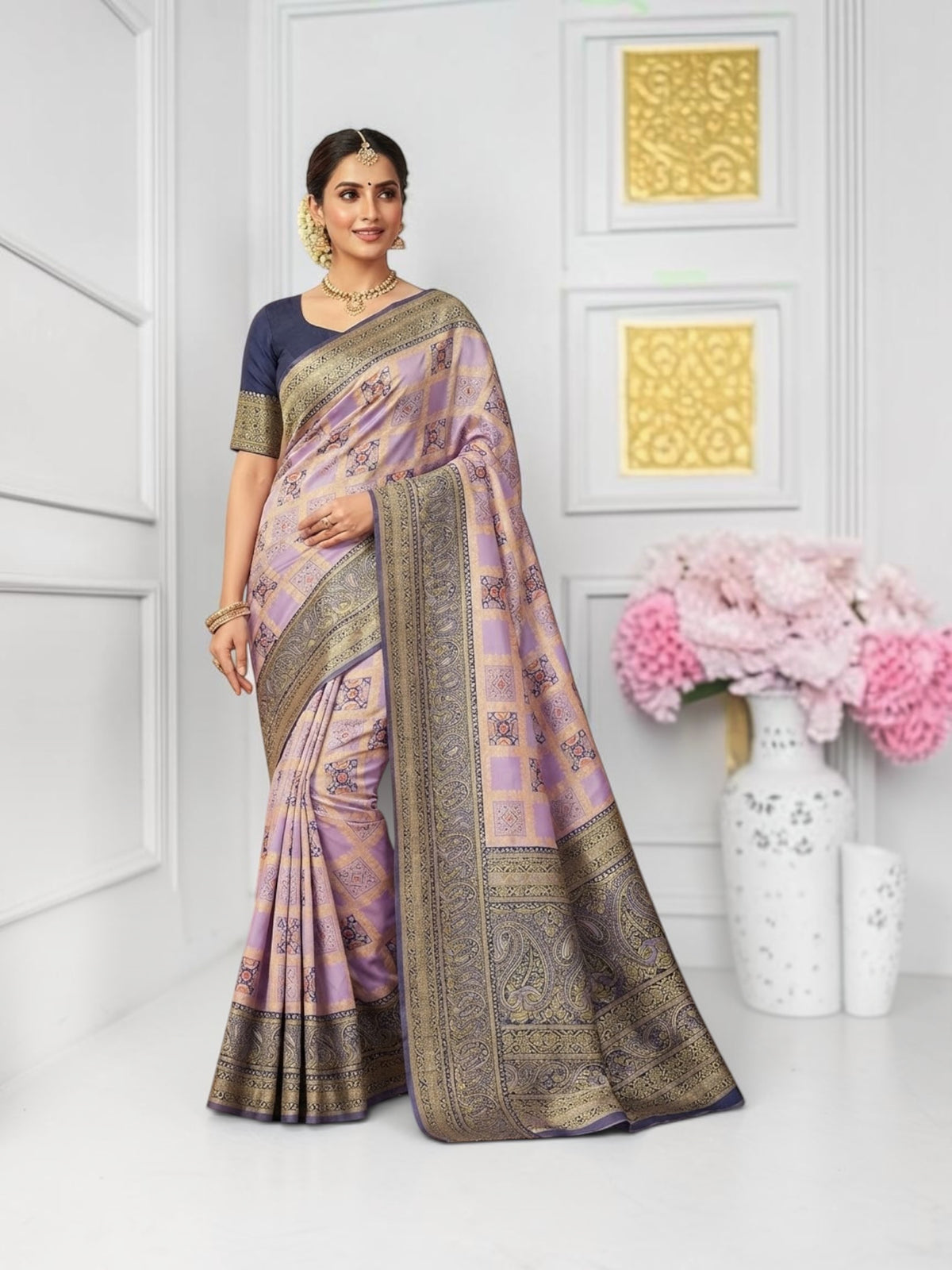 Traditional designer saree from Saree Ghor Charlotte featuring intricate embroidery and vibrant colors for cultural wear.