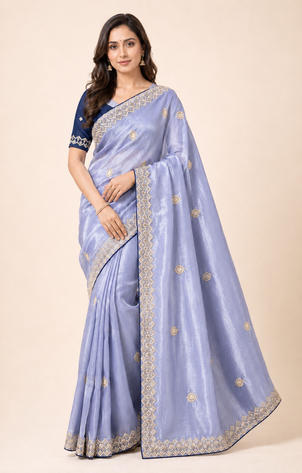 Traditional Saree by Saree Ghor Charlotte featuring intricate embroidery and vibrant colors, styled for cultural wear for women.
