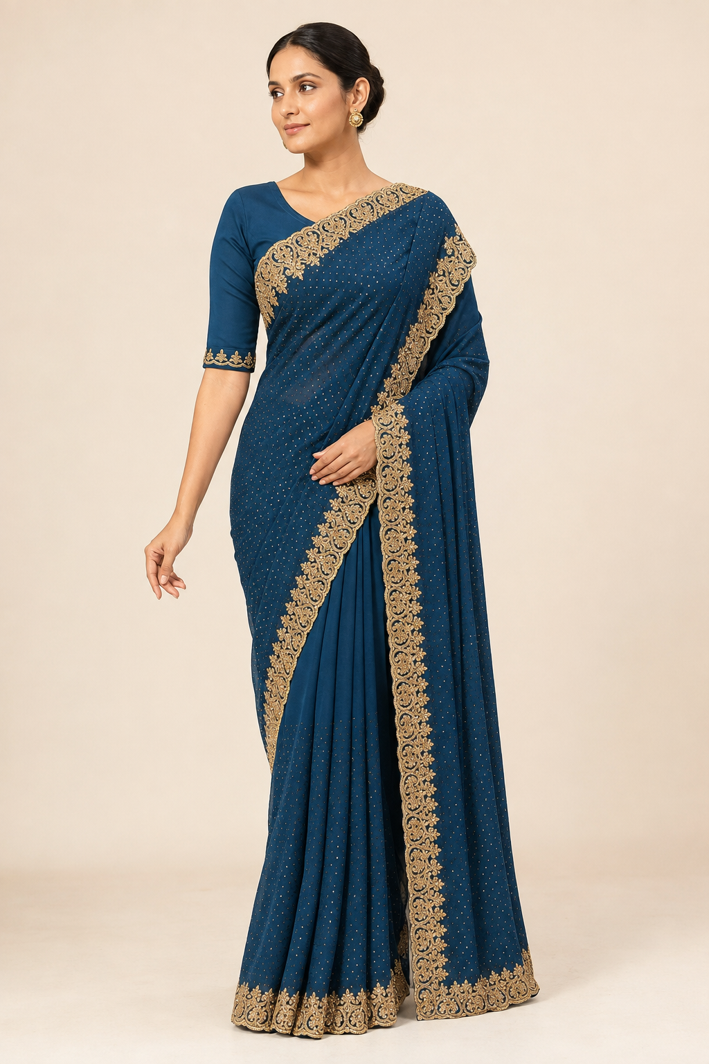Blue party wear stonework saree with ready blouse from Saree Ghor Charlotte, featuring intricate embellishments and elegant draping.
