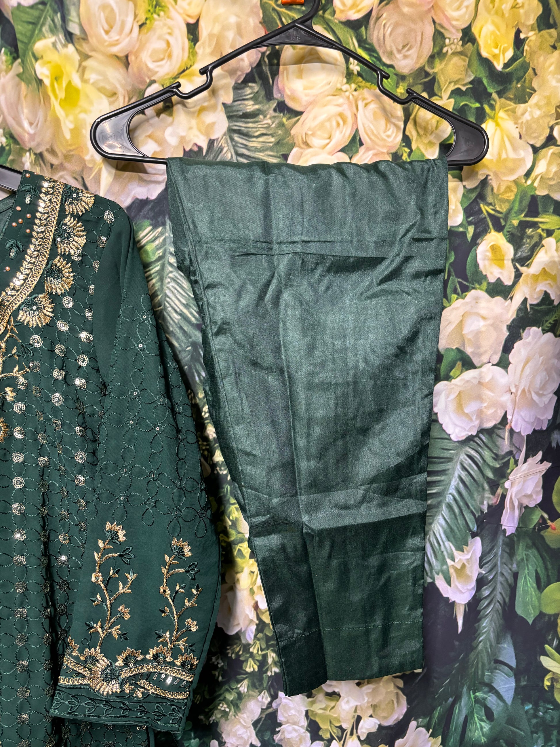 Faux Georgette Salwar Kameez with intricate embroidery, traditional cultural wear for women in vibrant colors.