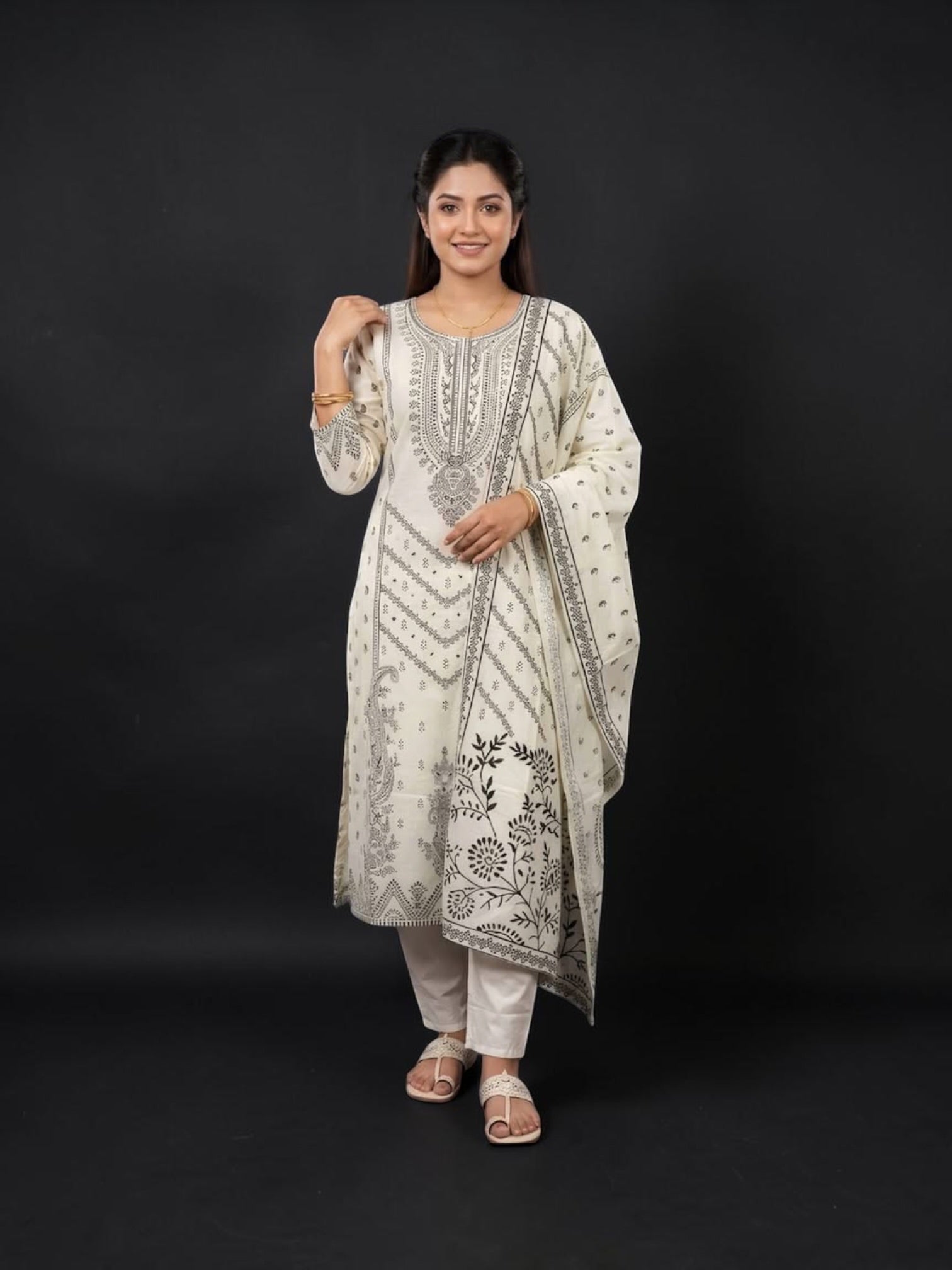 Traditional Salwar Kameez set for women by Saree Ghor Charlotte, featuring vibrant fabric and elegant design.