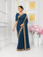 Blue party wear stonework saree with ready blouse from Saree Ghor Charlotte, featuring intricate embroidery and elegant drape.