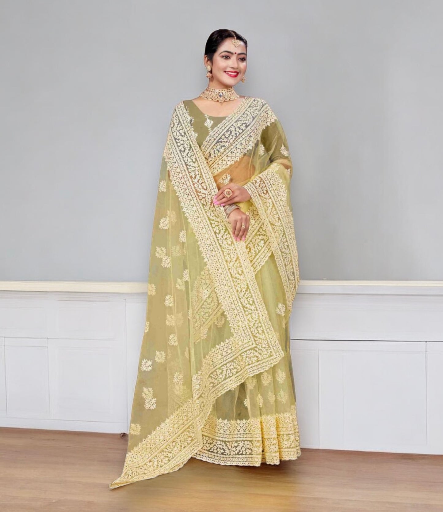 Enchanting Evening: Party Wear Net Saree with Intricate Embellishments