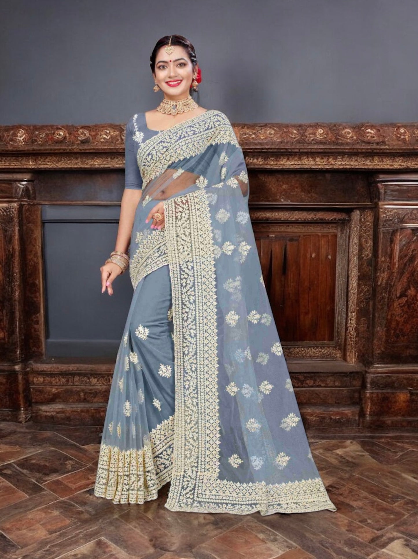 Enchanting Evening: Party Wear Net Saree with Intricate Embellishments