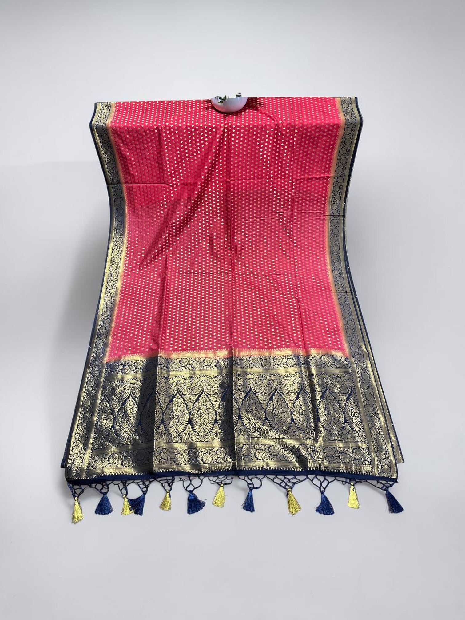 Elegant Opara silk saree from Saree Ghor Charlotte featuring traditional design, draped on a woman showcasing intricate details.