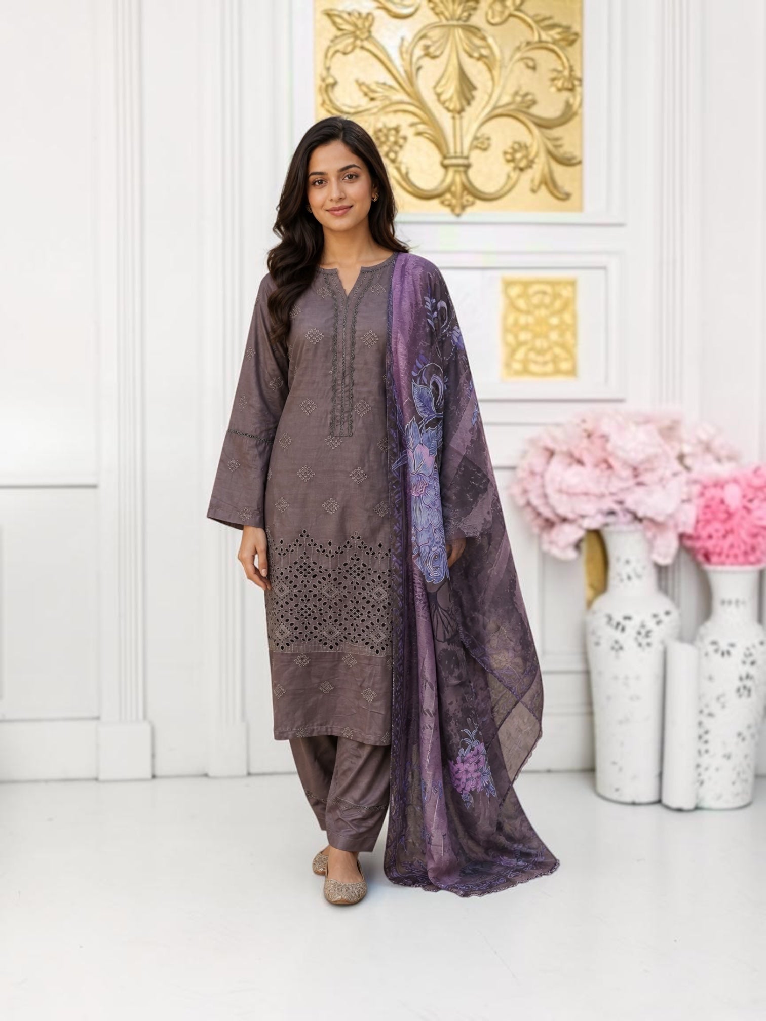 Traditional Pakistani salwar kameez for women by Saree Ghor Charlotte, featuring colorful fabric and intricate embroidery.