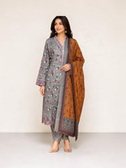 Traditional Pakistani Salwar Kameez for women, vibrant cultural wear by Saree Ghor Charlotte, featuring intricate embroidery and flowing fabric.