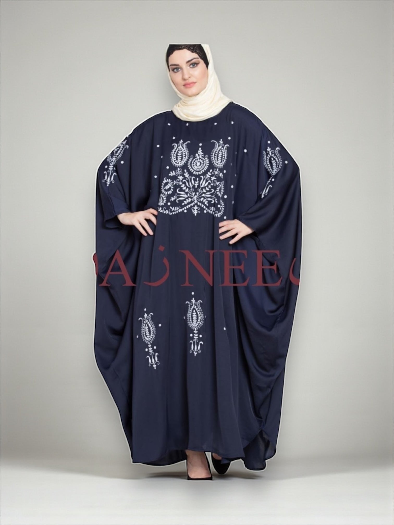 Women’s black Abaya Burqa by Saree Ghor Charlotte, modest Islamic dress with flowing fabric and elegant design.