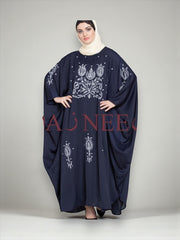 Women’s black Abaya Burqa by Saree Ghor Charlotte, modest Islamic dress with flowing fabric and elegant design.