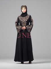 Women’s black Abaya Burqa by Saree Ghor Charlotte, modest Islamic dress with intricate embroidery, full-length and flowing.