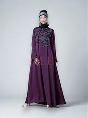 Women’s black Abaya Burqa by Saree Ghor Charlotte, modest Islamic dress with flowing fabric and elegant design.