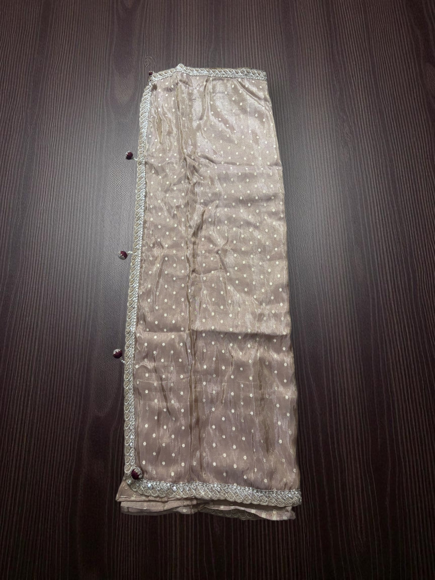 Designer Saree with Ready Blouse from Saree Ghor Charlotte, showcasing vibrant fabric and elegant draping for women's cultural wear.