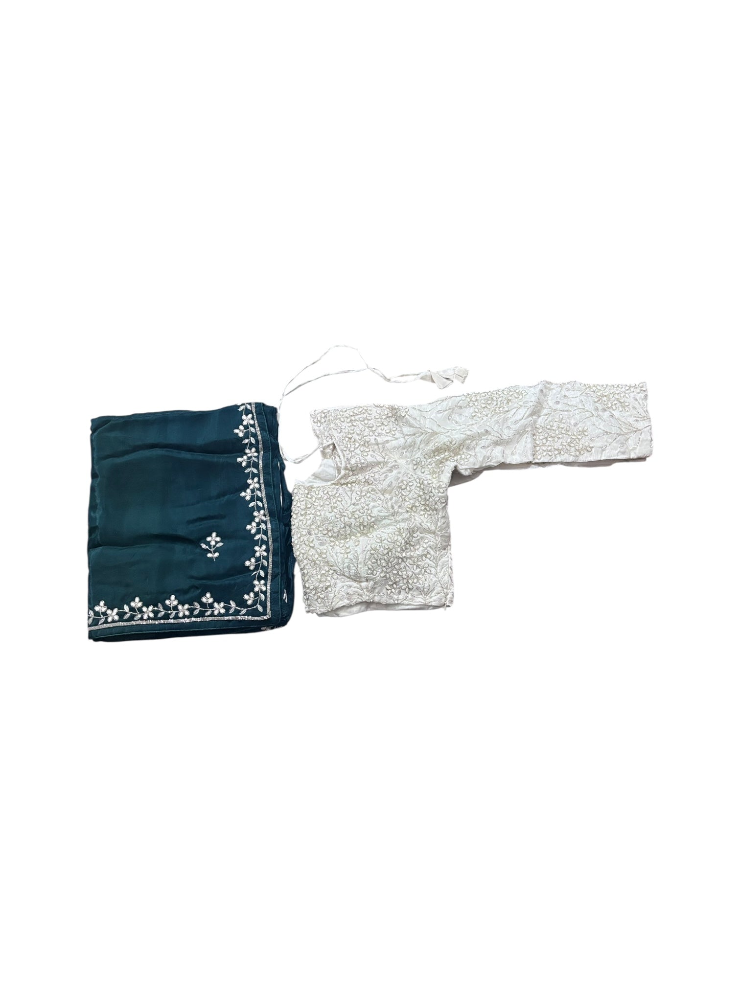 Elegant designer saree with ready blouse from Saree Ghor Charlotte, perfect for cultural wear, featuring intricate traditional patterns.
