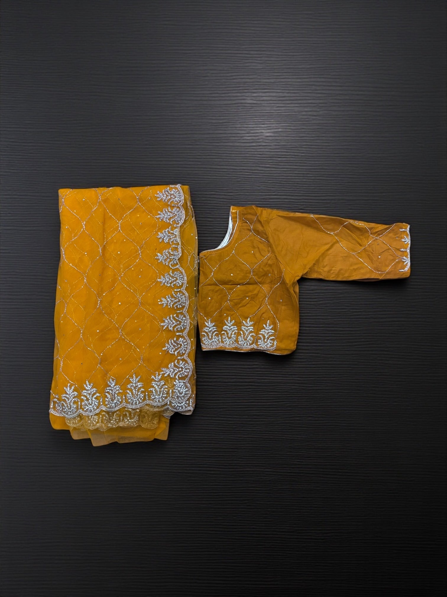 Designer Net Saree with ready blouse by Saree Ghor Charlotte, women’s cultural wear featuring intricate net fabric and elegant design.