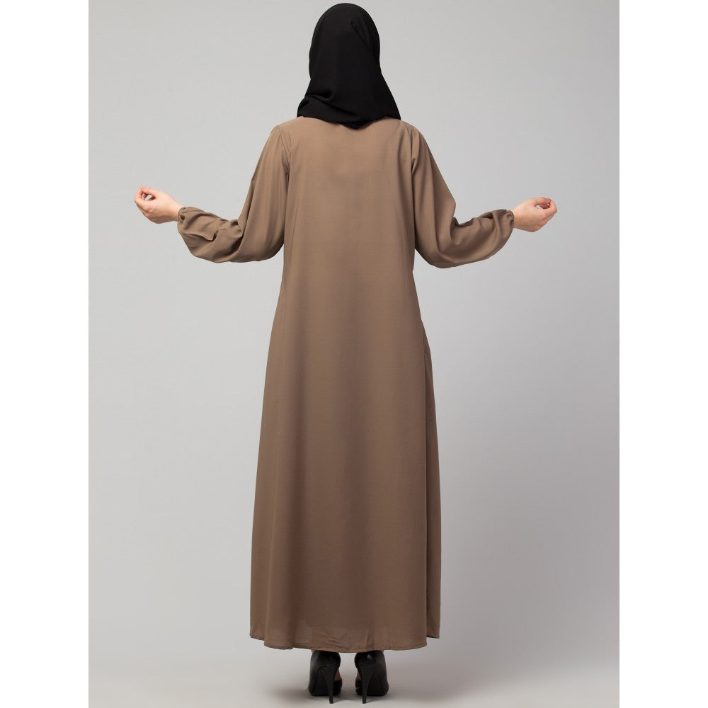 Women’s black Abaya Burqa by Saree Ghor Charlotte, modest Islamic dress with flowing fabric and elegant design, front view.