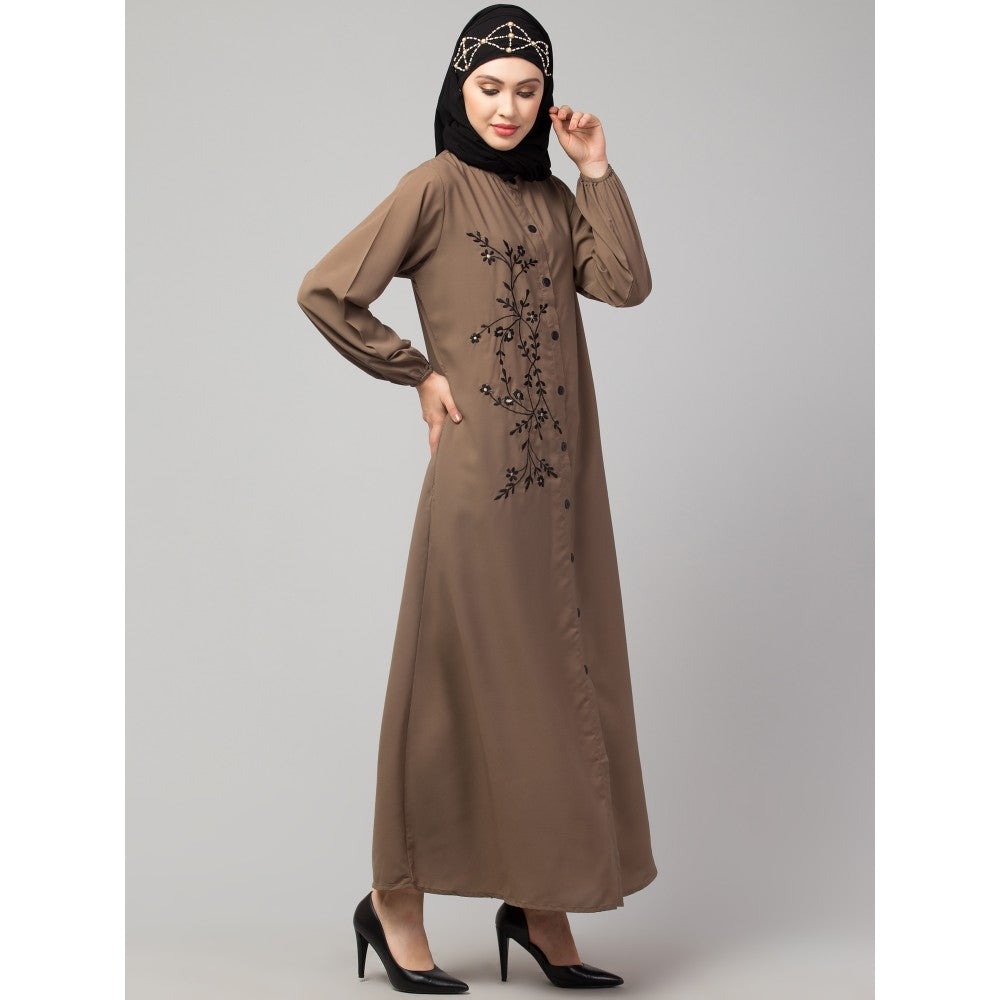 Women’s black Abaya Burqa by Saree Ghor Charlotte, modest Islamic dress with flowing fabric and elegant design.