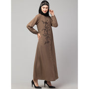 Women’s black Abaya Burqa by Saree Ghor Charlotte, modest Islamic dress with flowing fabric and elegant design.