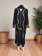 Women’s Saree Ghor Charlotte abaya, modest Islamic dress in black with intricate embroidery and flowing fabric.