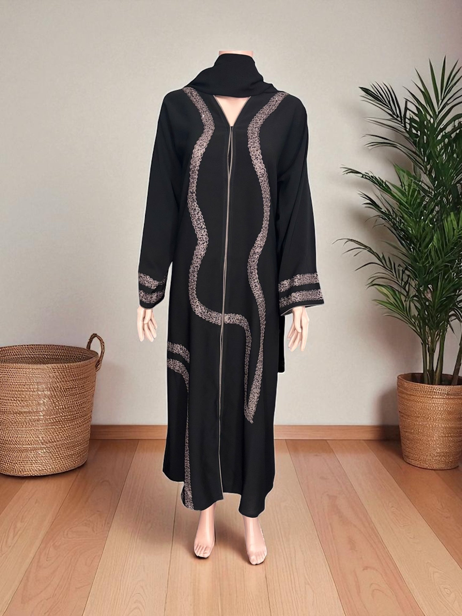 Women’s Saree Ghor Charlotte abaya, modest Islamic dress in black with intricate embroidery and flowing fabric.