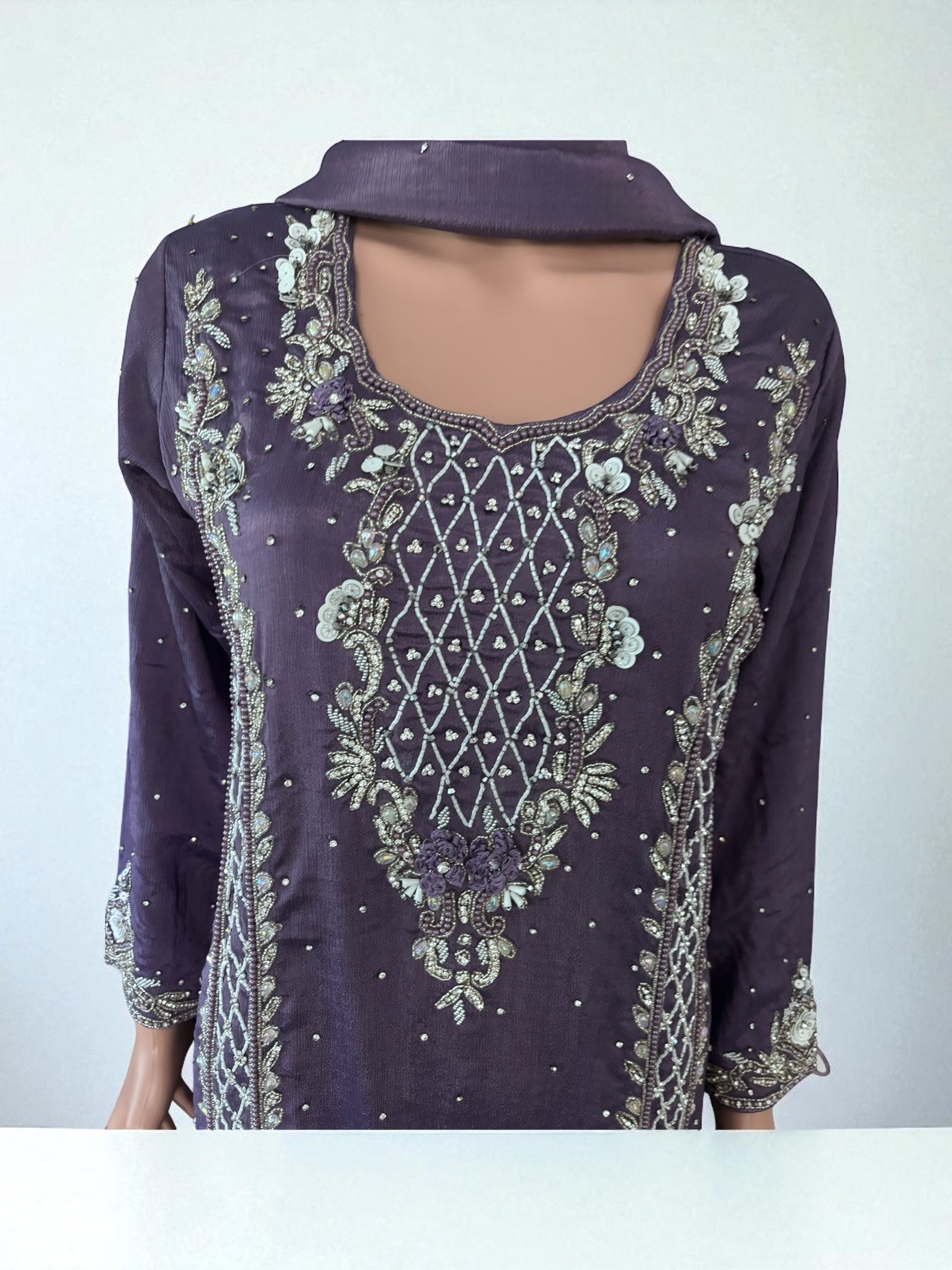 Heavy Work Salwar Kameez for women by Saree Ghor Charlotte, showcasing intricate embroidery and traditional cultural design.