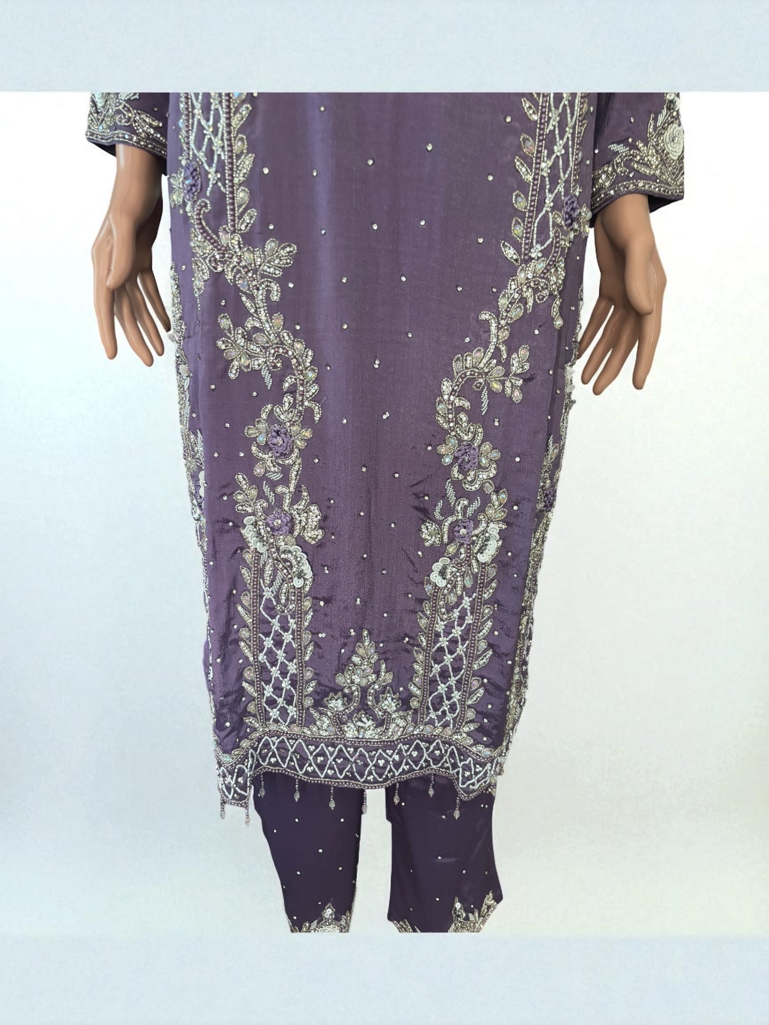 Heavy Work Salwar Kameez for women by Saree Ghor Charlotte featuring intricate embroidery and traditional cultural design.