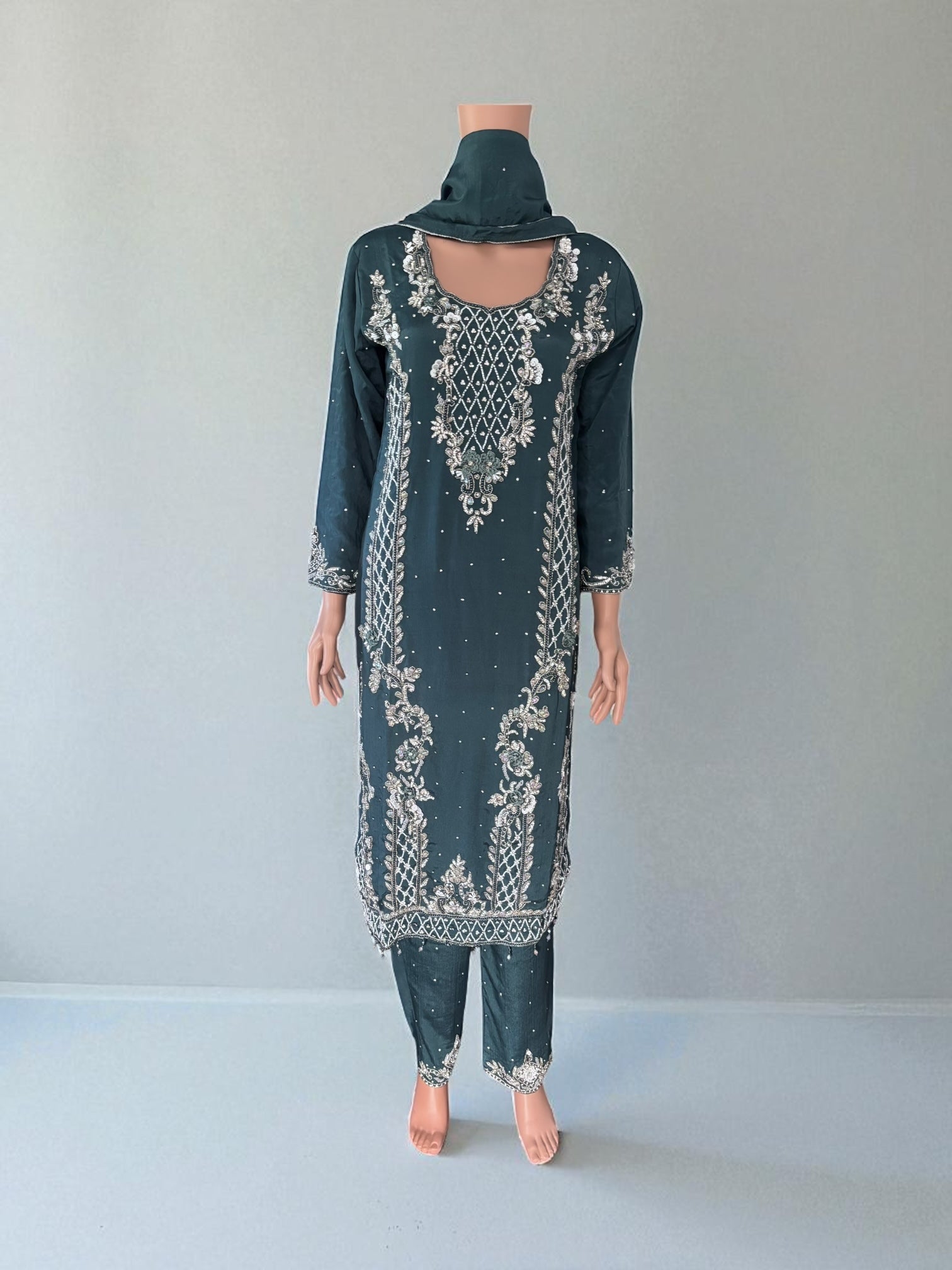 Heavy Work Salwar Kameez by Saree Ghor Charlotte featuring intricate embroidery and traditional cultural wear for women.