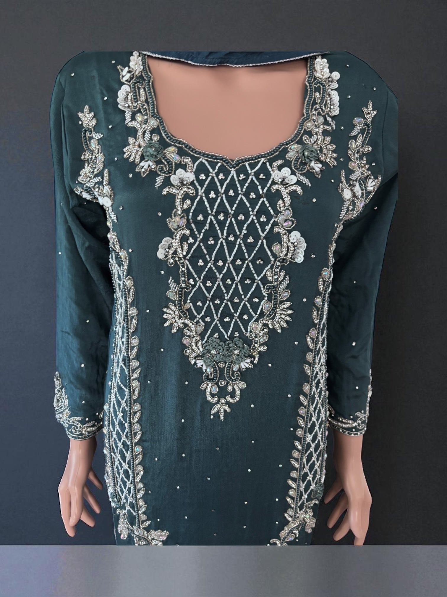 Heavy Work Salwar Kameez for women by Saree Ghor Charlotte, showcasing intricate embroidery and traditional cultural design.