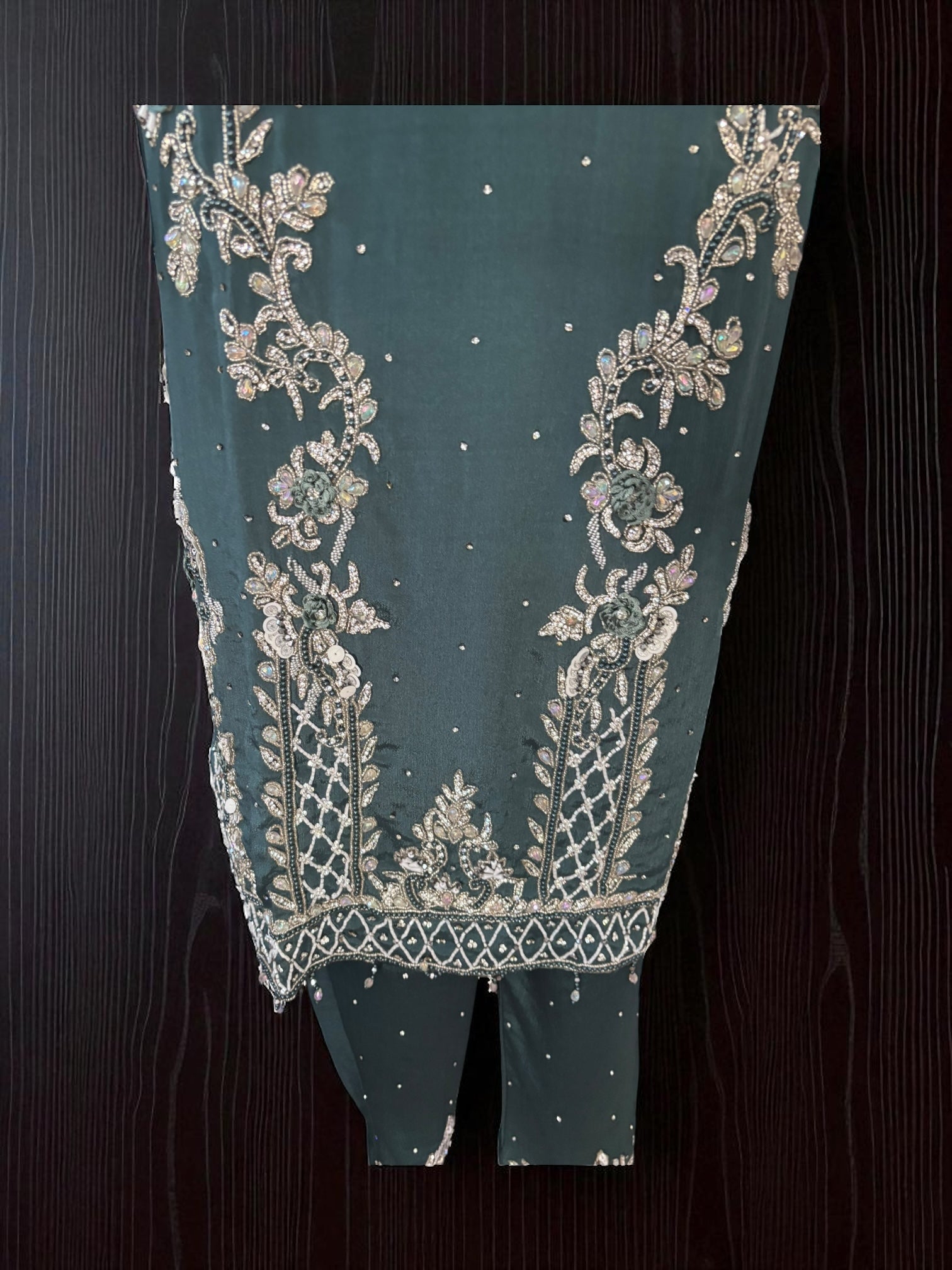 Heavy Work Salwar Kameez for women by Saree Ghor Charlotte, featuring intricate embroidery and traditional cultural design.