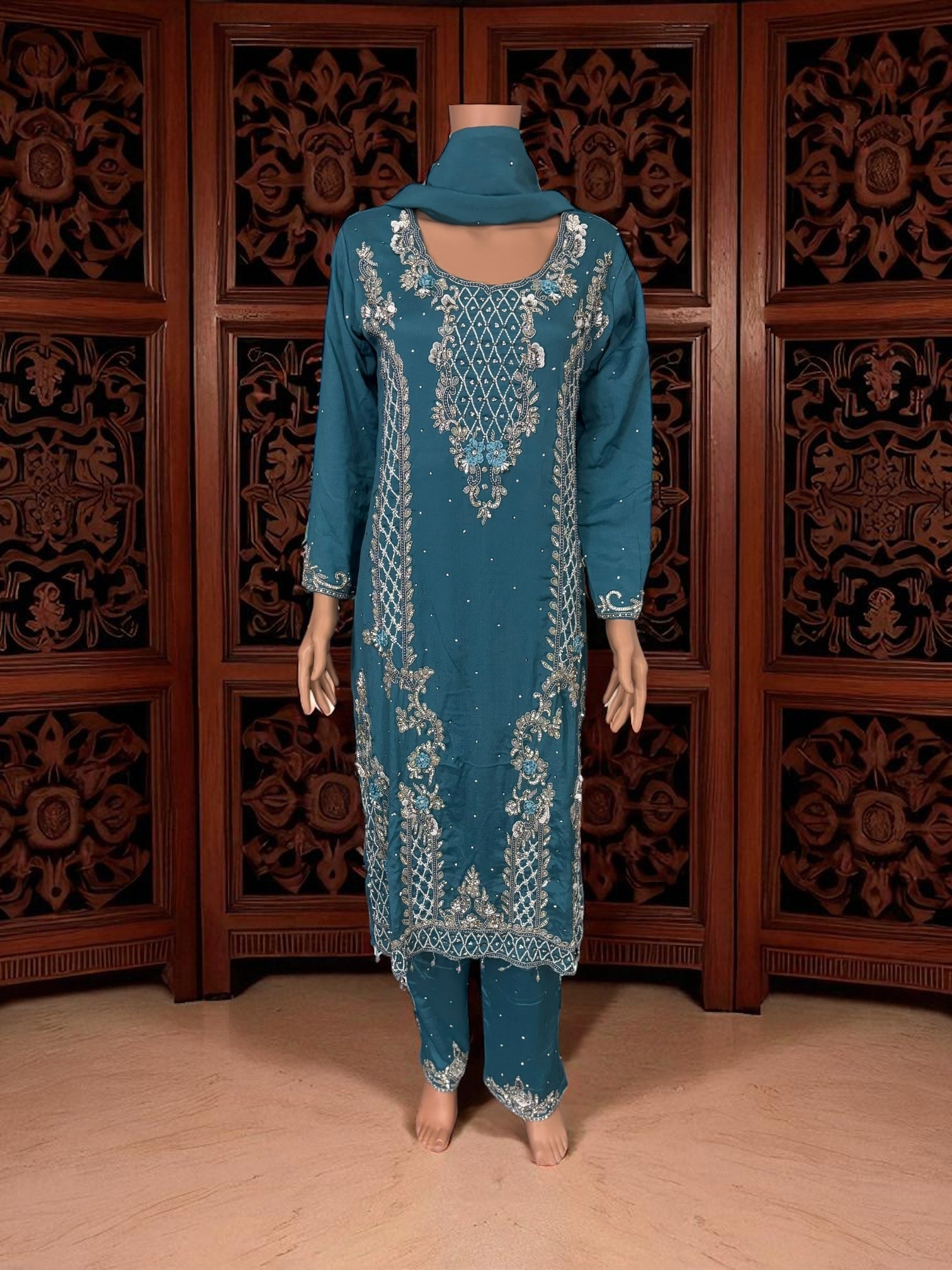 Heavy Work Salwar Kameez for women by Saree Ghor Charlotte, showcasing intricate embroidery and traditional cultural wear.