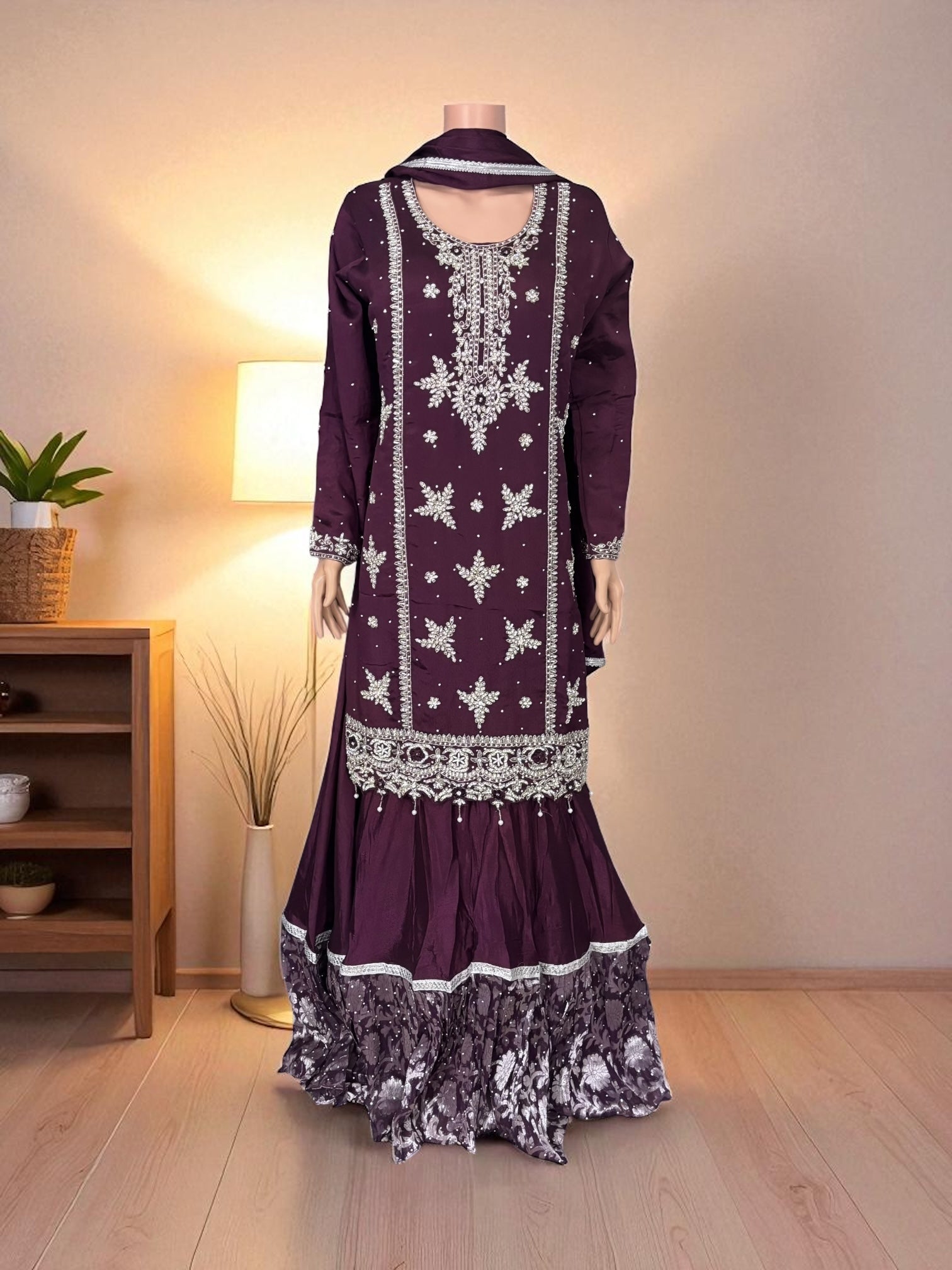 Heavy work Salwar Kameez by Saree Ghor Charlotte featuring intricate embroidery and vibrant fabric for women’s cultural wear.