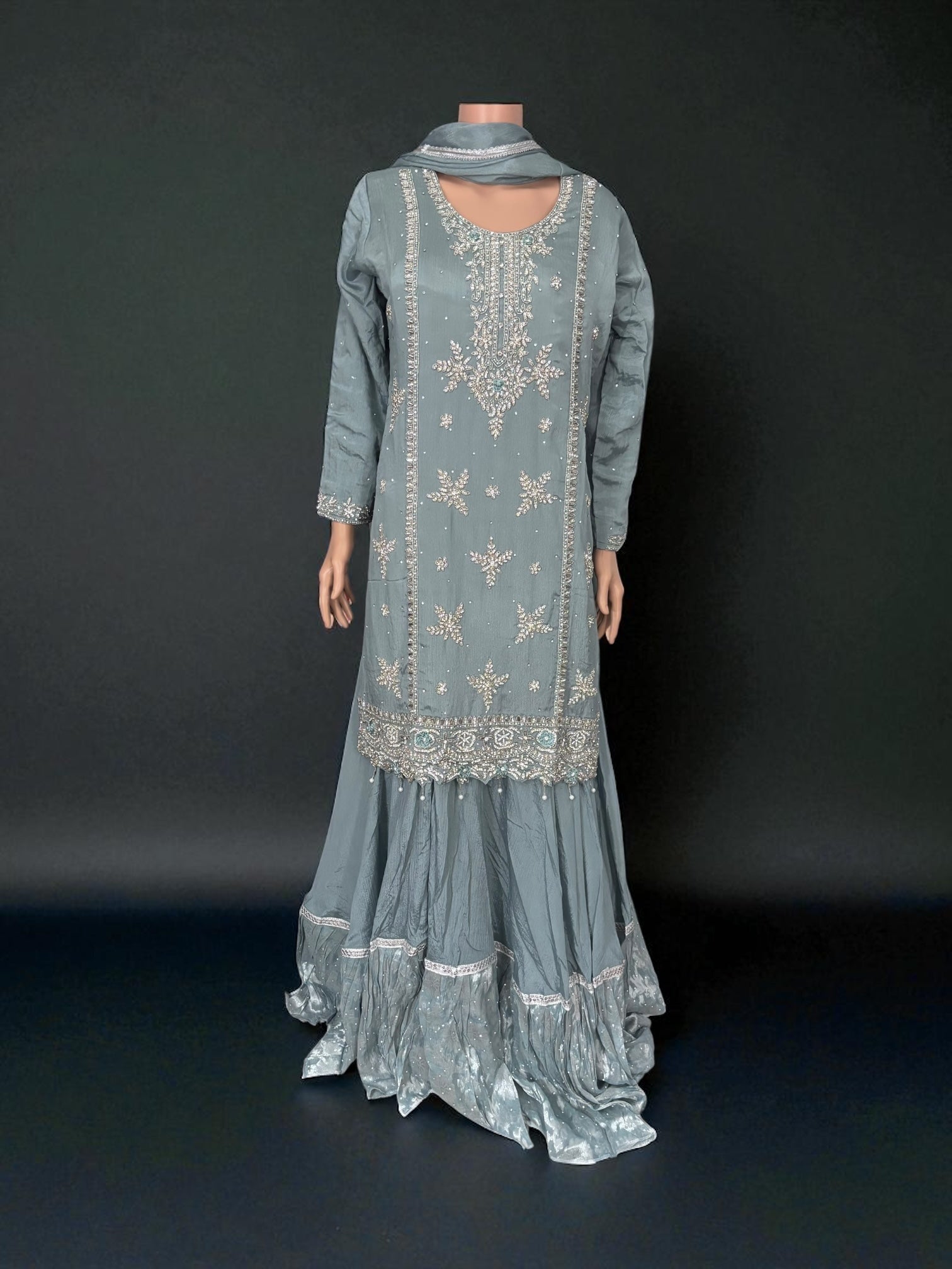 Elegant Heavy Work Salwar Kameez for women by Saree Ghor Charlotte, showcasing intricate embroidery and traditional cultural style.