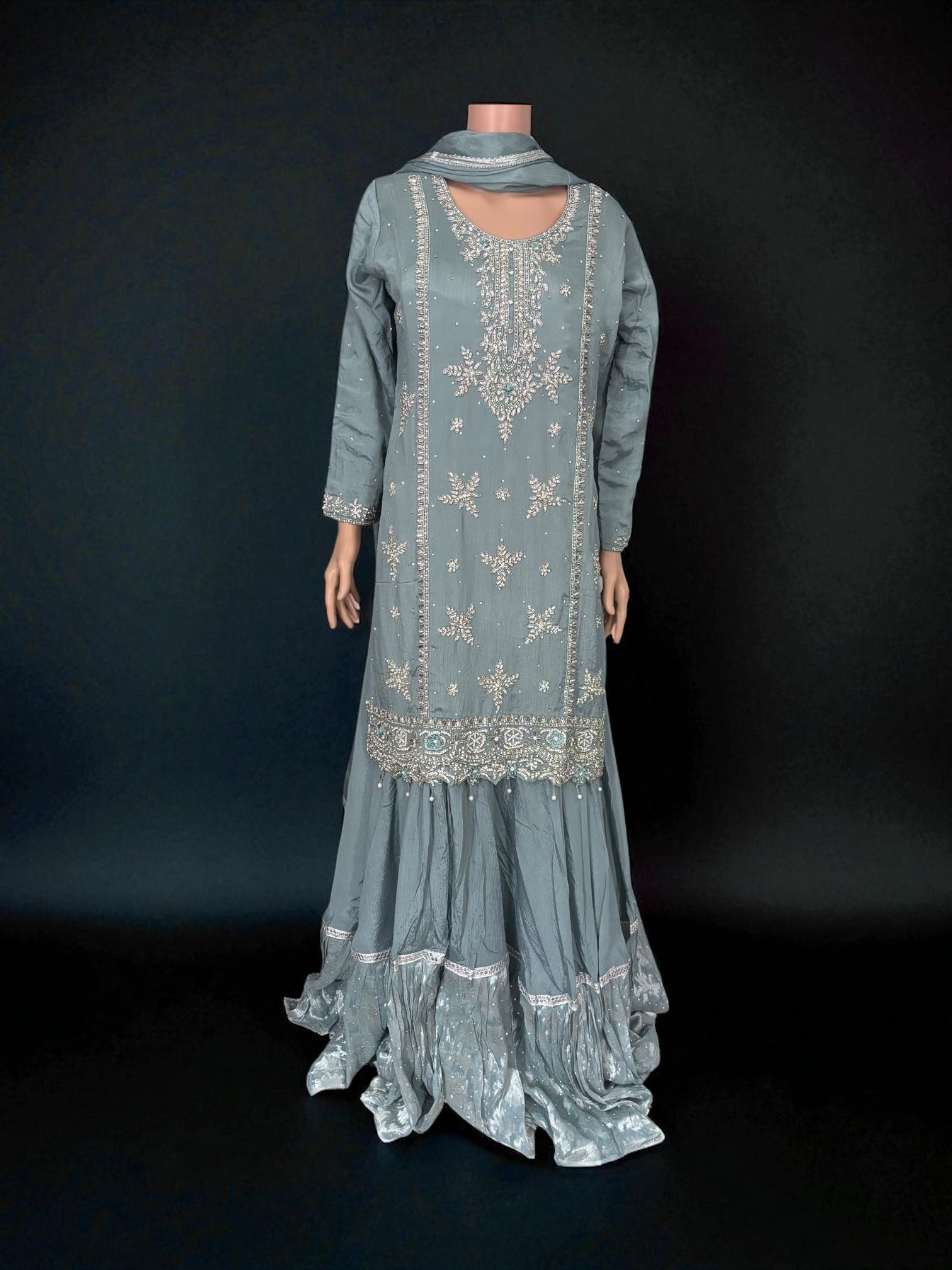 Heavy Work Salwar Kameez for women by Saree Ghor Charlotte, featuring intricate embroidery and traditional cultural design.