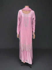 Heavy Work Salwar Kameez by Saree Ghor Charlotte, traditional women's cultural wear with intricate embroidery and vibrant fabric.
