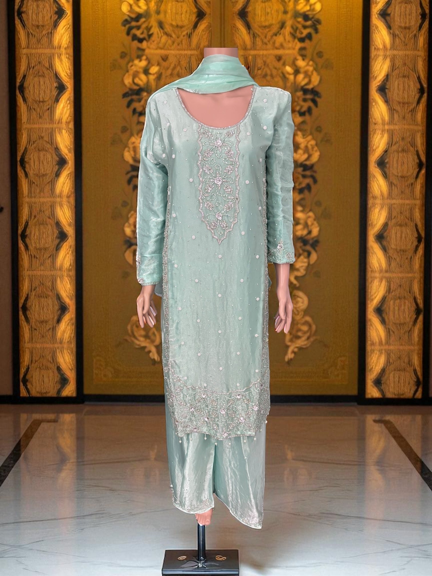 Heavy Work Salwar Kameez for women by Saree Ghor Charlotte, showcasing intricate embroidery and traditional cultural wear.