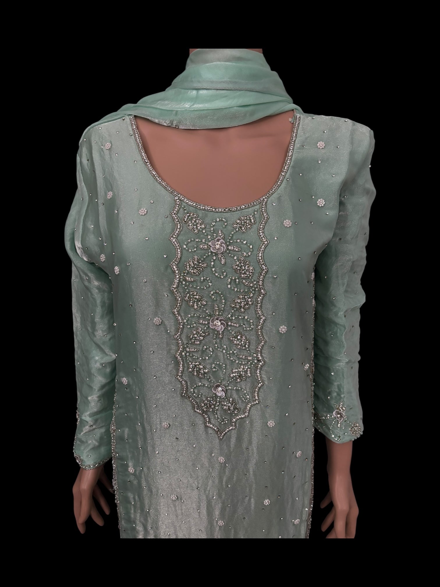 Heavy Work Salwar Kameez by Saree Ghor Charlotte featuring intricate embroidery and traditional design for women.